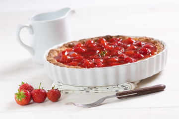 sweet strawberry pie on a white table