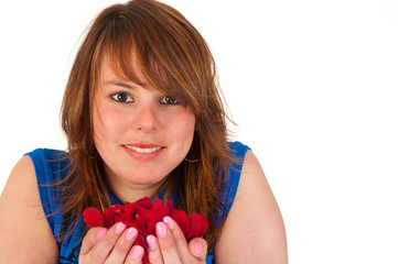 Beautiful girl with rose leaves