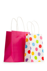 Colourful paper shopping bags isolated on white