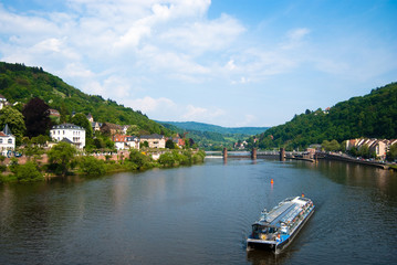 Tourist boat on Neckar river in Heidelberg