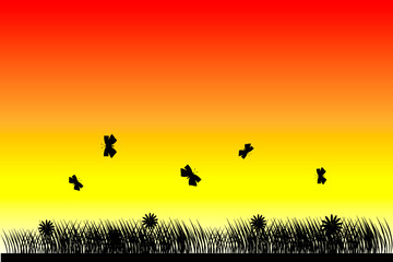 Fototapeta na wymiar Butterflies at sunset background