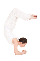 Young woman doing yoga exercise