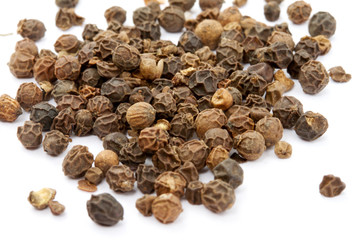 a pile of peppercorns
