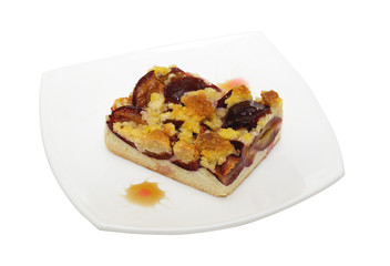 Fresh baked plum cake with pwdered sugar