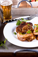 Rustic meat dish with baked vegetables