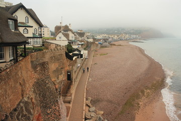 thatched houses above Sidmouth beach
