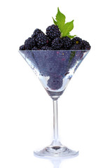 Fototapeta na wymiar beautiful blackberries in glass isolated on white