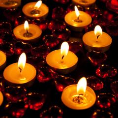 Candles and decorative red heart