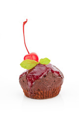 Delicious chocolate muffin with jam.