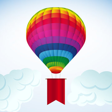 Background white clouds and colorful hot air balloon.
