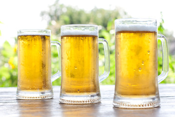 three mug of beer