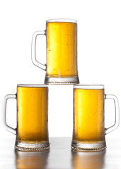 three mugs of beer