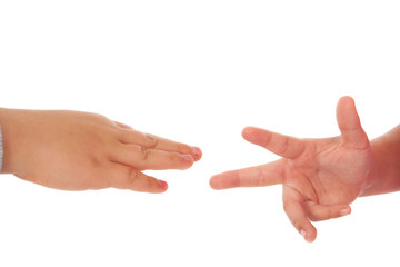 two children playing rock paper scissors