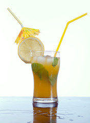 citrus coctail drink with ice cubs