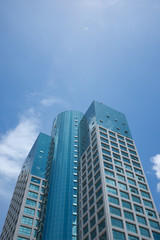 High rise buildings with blue sky