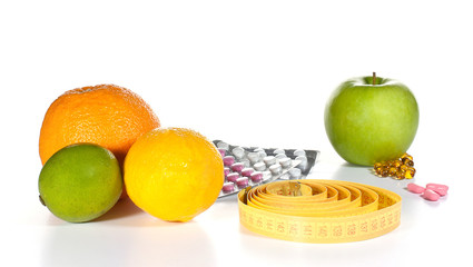 Tape measure, diet pills and fruits