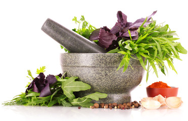 spices and mortar isolated on white