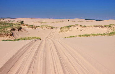 Fototapeta na wymiar Drive through sand dunes near Lake Michigan