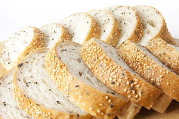 sliced bread, line up sliced sesame bread.