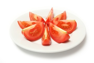 Tomatoes on white plate