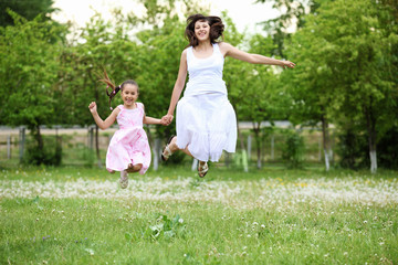 Young mother and her young daughter