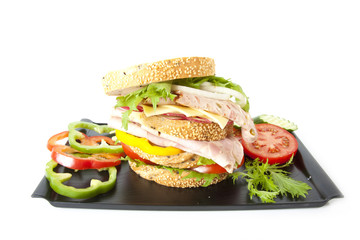 junk food, big meal junk food sandwich decorated in black tray.