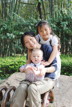 mother,sister and little baby boy