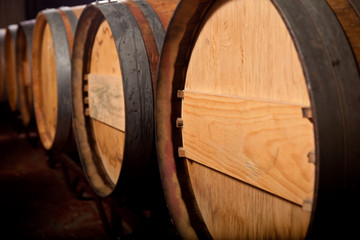 Wine barrels in an aging cellar of Ribera del Duero, Spain