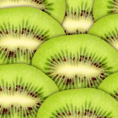 Papier Peint photo Tranches de fruits Abstrait vert avec des tranches de kiwi cru