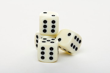 Four dice on a white background.