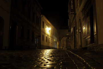 European street at night after rain