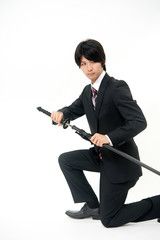 a businessman with samurai sword