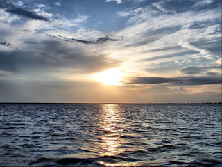 Pastel sunrise over lake