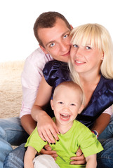 family on carpet
