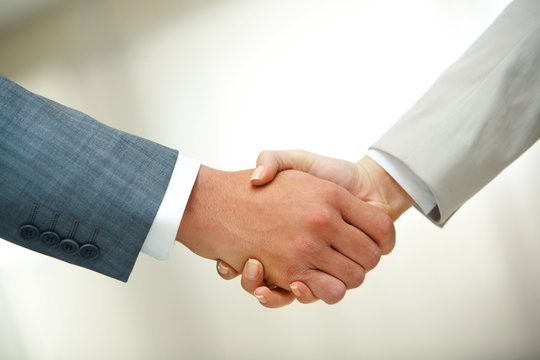 Handshake after striking deal
