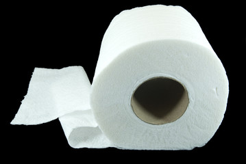 Toilet paper isolated on black.