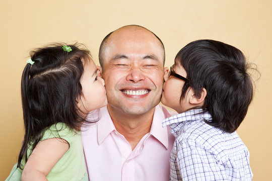 Asian father and kids