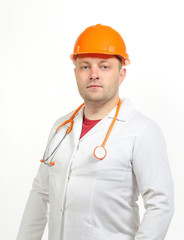 A man in a white coat, helmet and phonendoscope.
