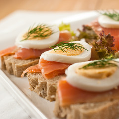 Canapes with salmon and egg