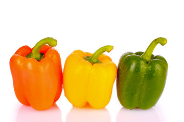 Three bell peppers isolated on white