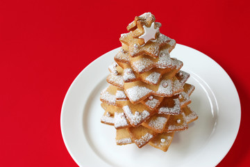 christmas tree cookie on a red background