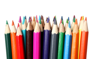 Many color pencils on a white background