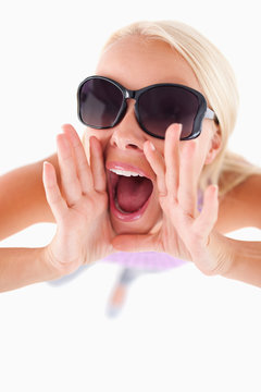 Charming lady with sunglasses in high spirits