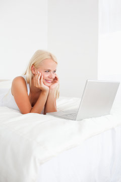 Portrait of a beautiful woman using a laptop
