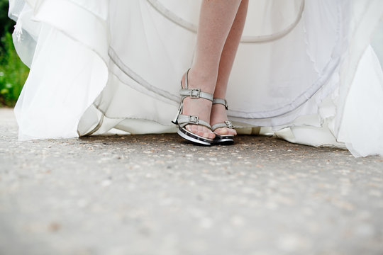 closeup photo of beautiful bride's shoes