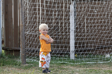 Child stands in the gateway