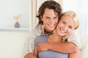 Fototapeta premium Young couple embracing each other