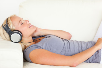 Beautiful woman listening to music