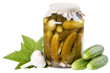 Glass jar with pickled cucumbers