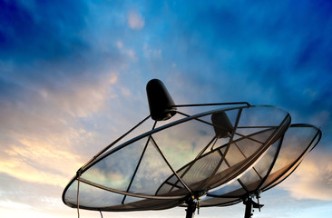 satellite dish on sunset background
